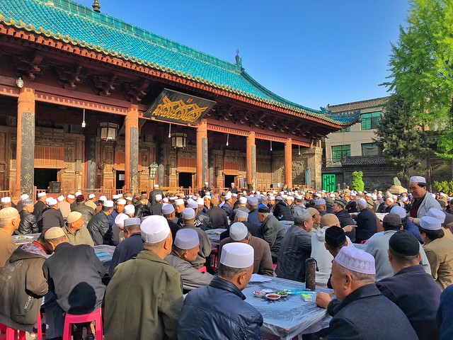 Hombres hui en la Gran Mezquita de Xi'an (China)